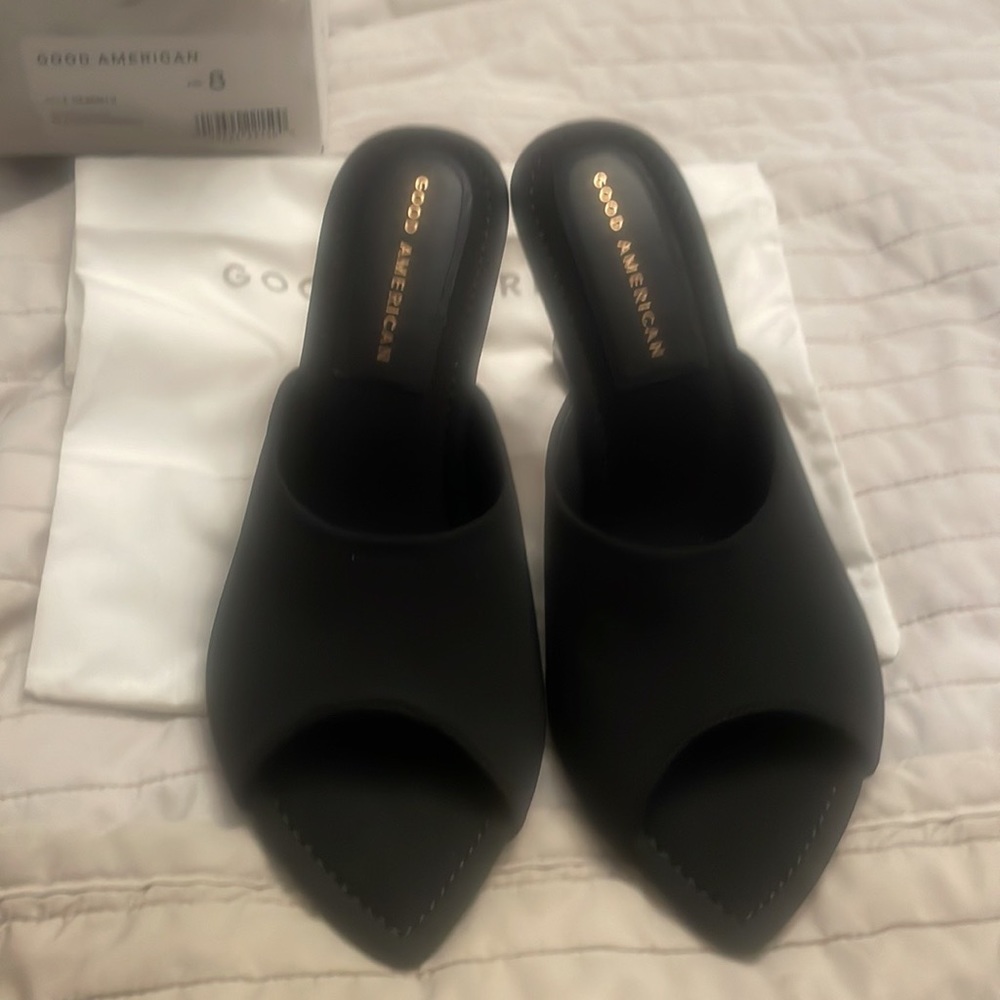 Neoprene mule with a chunky lucite heel slip on by good American khole kardasian